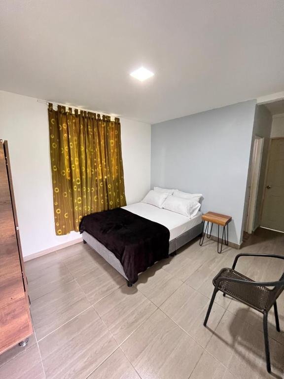 Finca Quimbaya Quindio piscina Finca familiar descanso paisaje cafetero finca tipica campesina alquiler por dias finca cerca del parque de los arrieros parque del cafe Panaca juegos niños cómodas habitaciones Amplios baños Via pavimentada