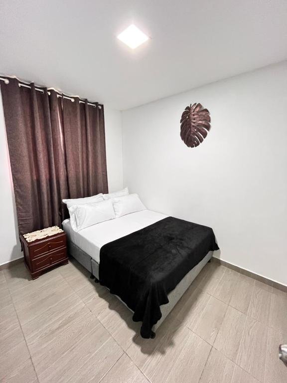 Finca Quimbaya Quindio piscina Finca familiar descanso paisaje cafetero finca tipica campesina alquiler por dias finca cerca del parque de los arrieros parque del cafe Panaca juegos niños cómodas habitaciones Amplios baños Via pavimentada