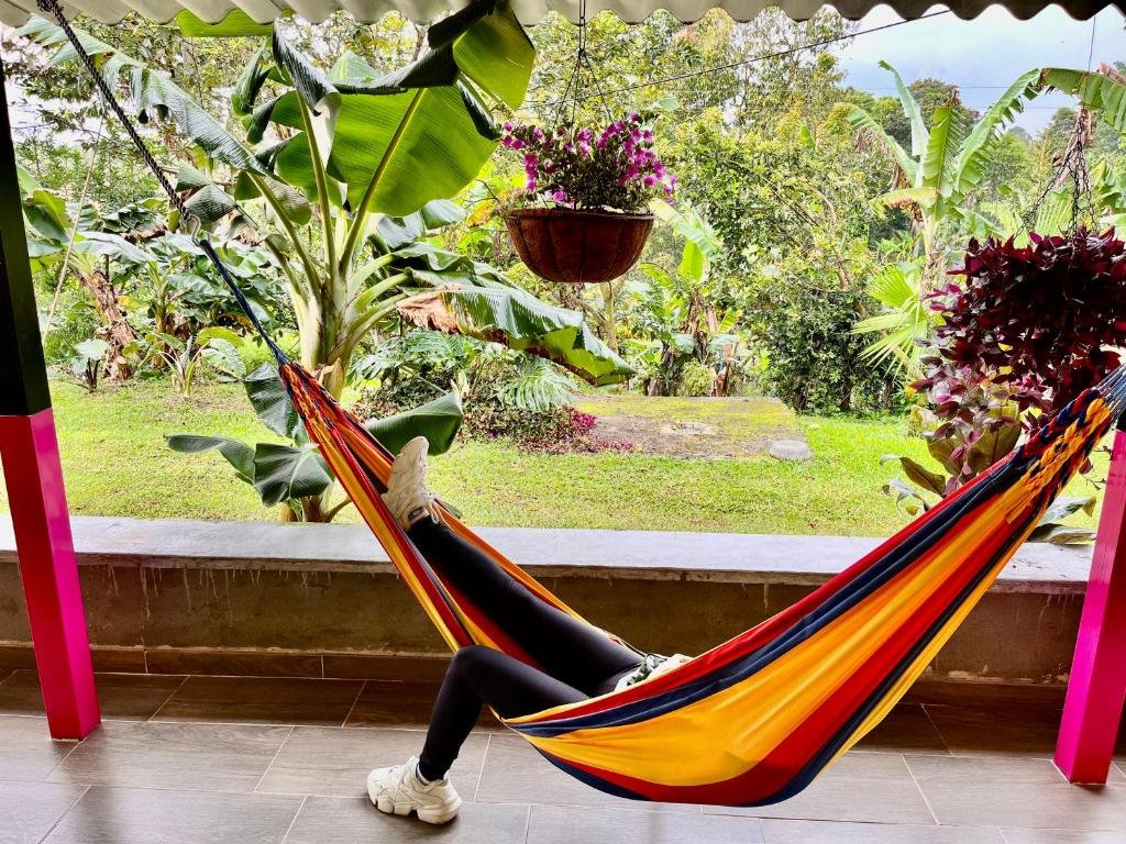 Finca Quimbaya Quindio piscina Finca familiar descanso paisaje cafetero finca tipica campesina alquiler por dias finca cerca del parque de los arrieros parque del cafe Panaca juegos niños cómodas habitaciones Amplios baños Hamacas