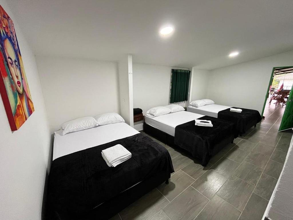 finca Quimbaya Quindio piscina Finca familiar descanso paisaje cafetero finca tipica campesina alquiler por dias finca cerca del parque de los arrieros parque del cafe panaca juegos niños cómodas habitacione