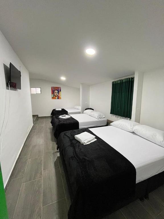 finca Quimbaya Quindio piscina Finca familiar descanso paisaje cafetero finca tipica campesina alquiler por dias finca cerca del parque de los arrieros parque del cafe panaca juegos niños cómodas habitaciones